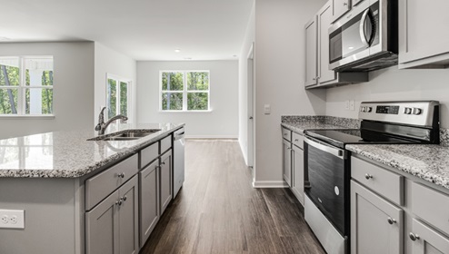 New Homes in Wimington NC. Grayson Park Community. Our popular ARIA - great one level open plan with a showstopper kitchen! Perfect for family living and entertaining! Has oversized island, Stainless Steel Appliances. Aria Floorplan.
