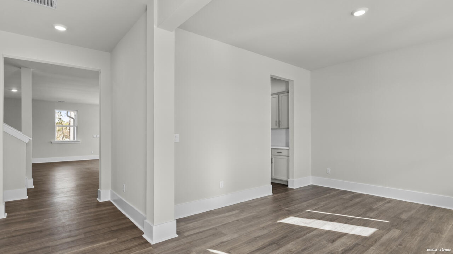 The kitchen is loaded with features including a granite island, 36'' cabinets, stainless-steel appliances and is open and expansive with a large island that overlooks the living room and the eat in kitchen area.