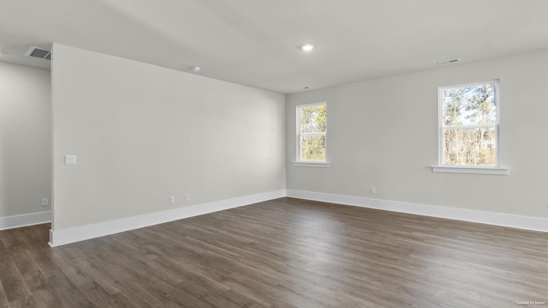 The kitchen is loaded with features including a granite island, 36'' cabinets, stainless-steel appliances and is open and expansive with a large island that overlooks the living room and the eat in kitchen area.