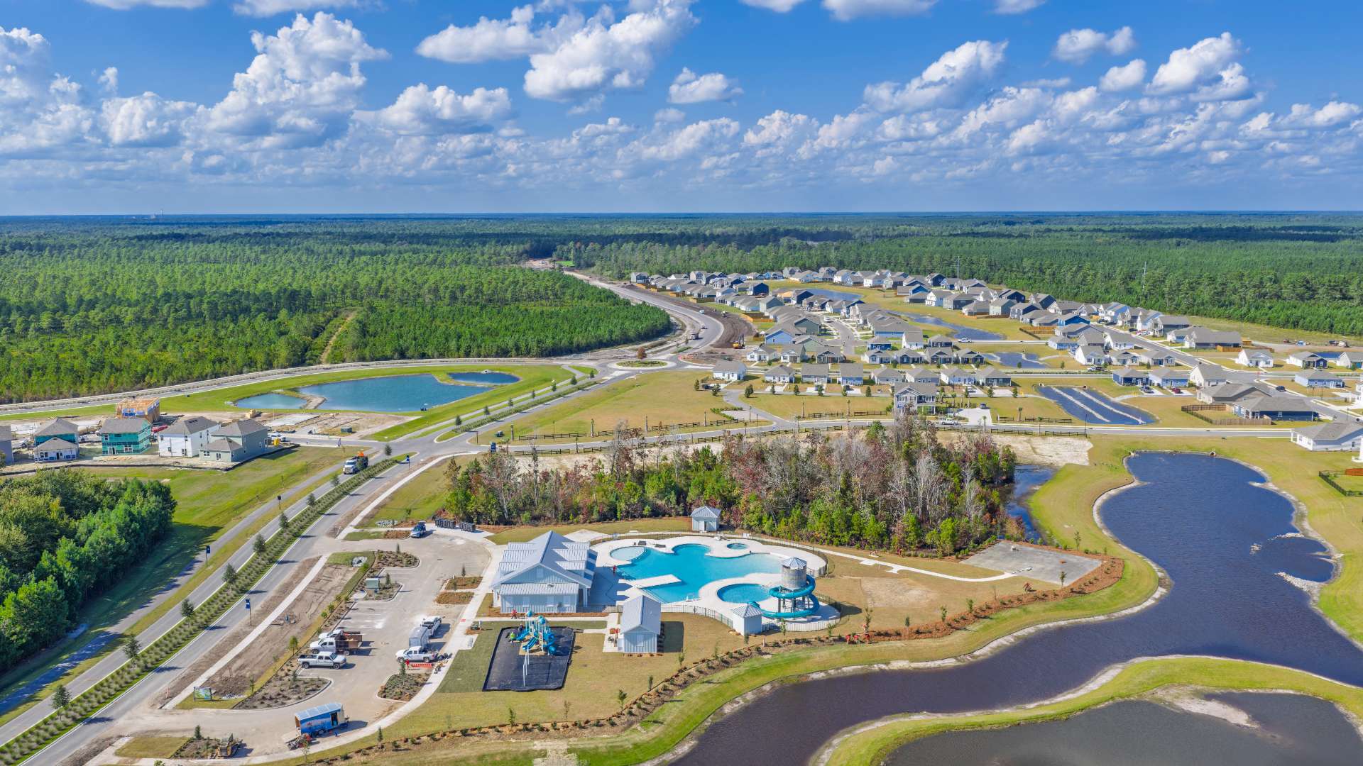 The amenity center that will include a swimming pool, multi-sport court, splashpad, playground, and fire pit, ensuring a well-rounded and enjoyable living experience.