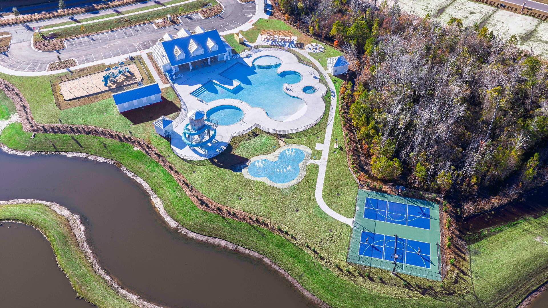 The amenity center will include a swimming pool, multi-sport court, and fire pit, ensuring a well-rounded and enjoyable living experience.