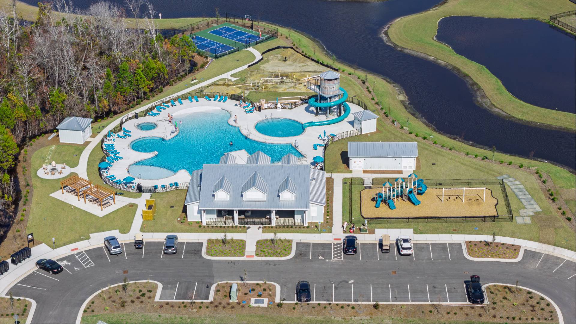 The amenity center that will include a swimming pool, multi-sport court, splashpad, playground, and fire pit, ensuring a well-rounded and enjoyable living experience.