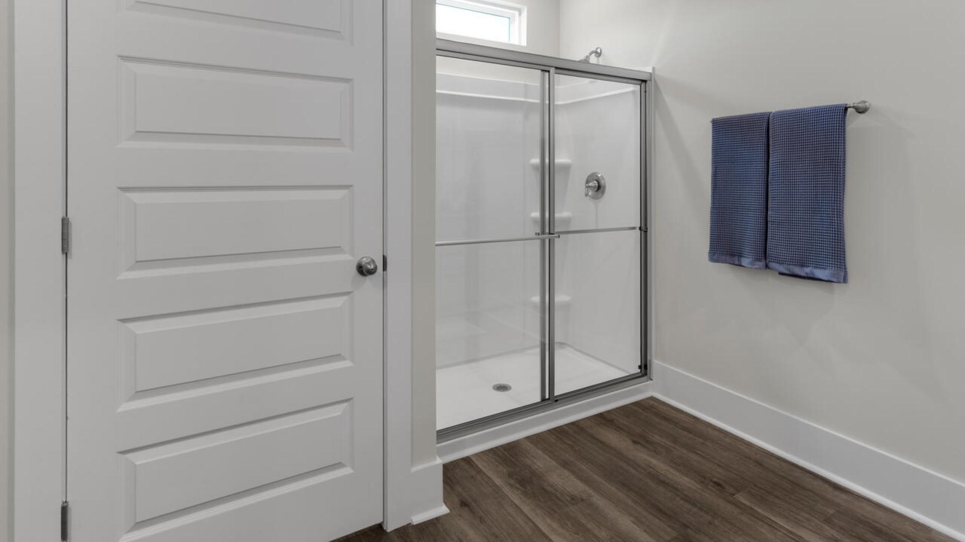 A large primary suite with bath that features separate sinks, granite countertops and a large walk-in closet. Whether these rooms become bedrooms, office spaces, or other bonus rooms, there is sure to be comfort. In every bedroom you’ll have carpeted floors and a closet in each room. Whether these rooms become bedrooms, office spaces, or other bonus rooms, there is sure to be comfort.