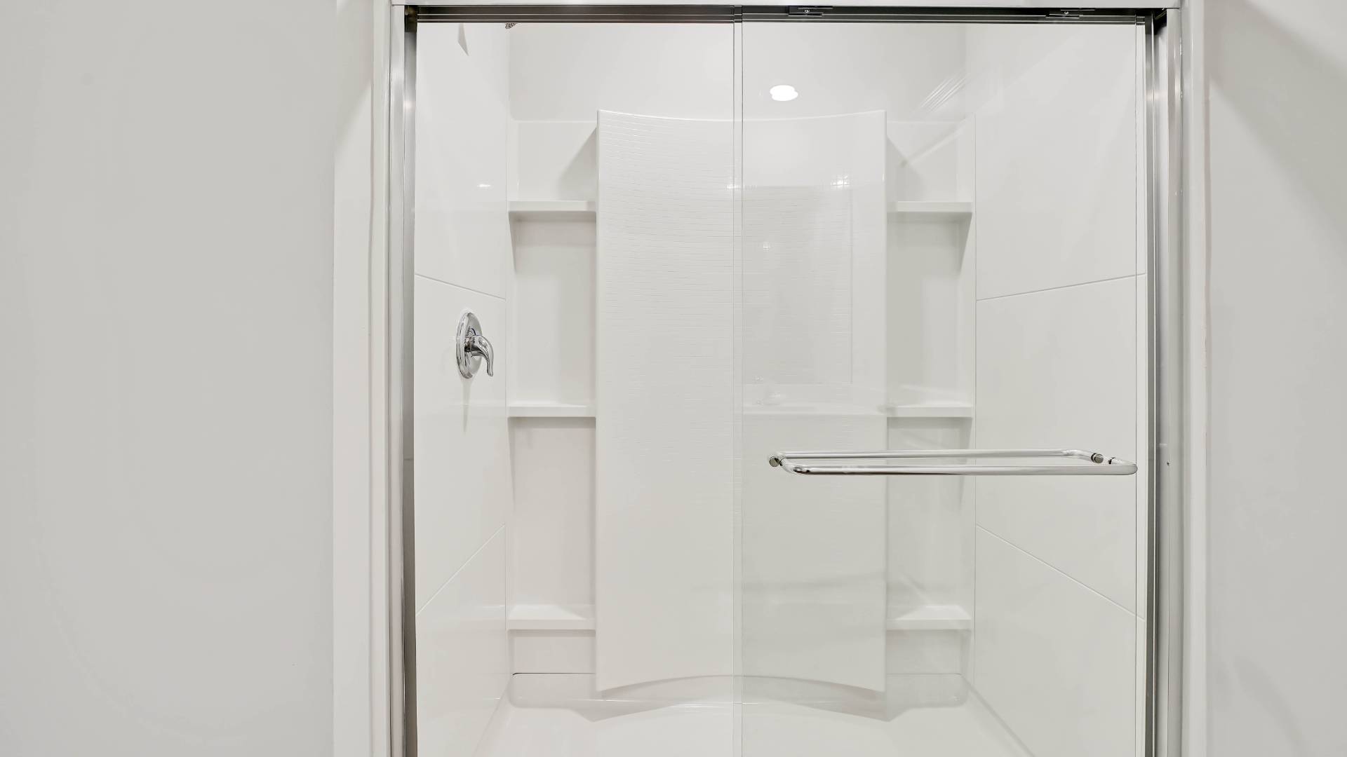 There are 3 additional bedrooms, a full bathroom, a walk-in laundry room, and a loft-style living room on the second level.