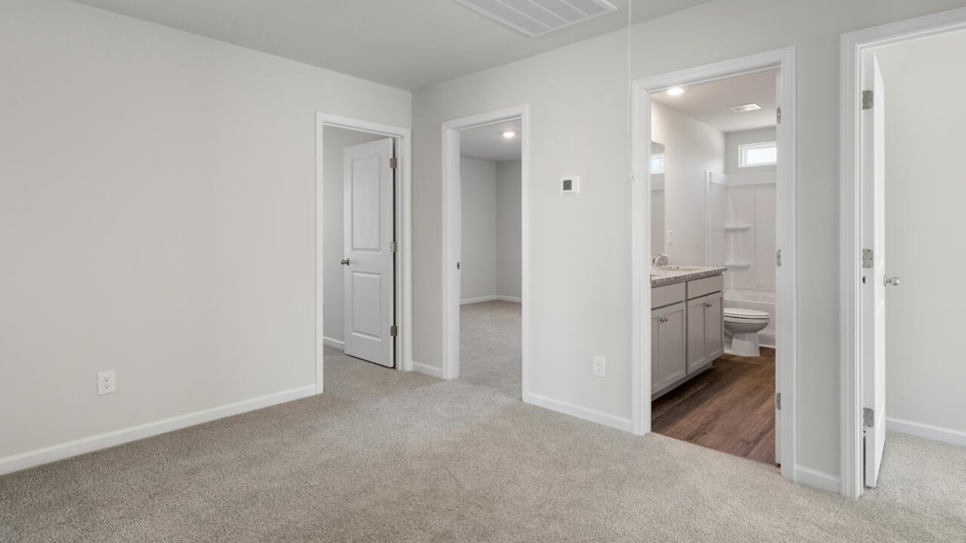 The Tillman floorplan features a first-floor primary suite, formal dining room, a large open living space divided by a kitchen island, and powder room on the first floor. Upstairs you are greeted by an convenient lof