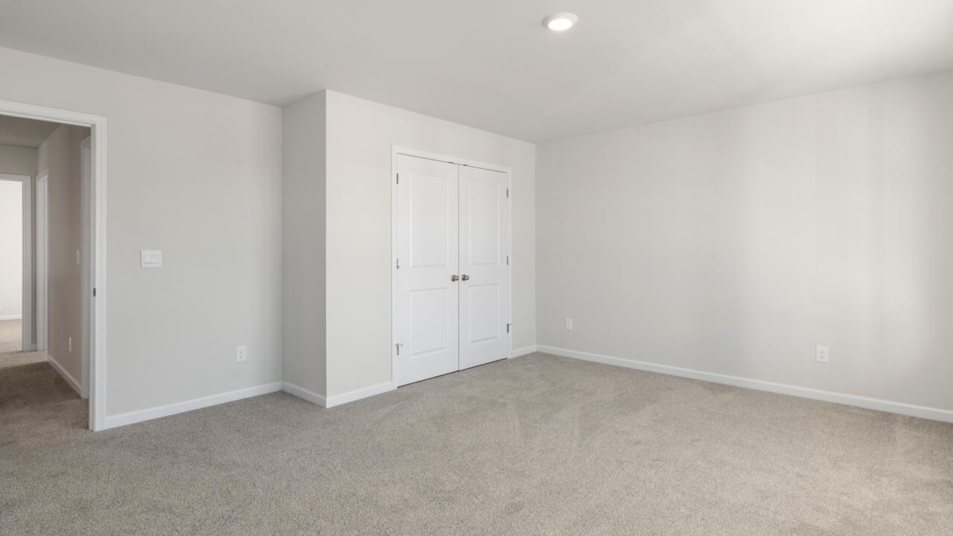 The Tillman floorplan features a first-floor primary suite, formal dining room, a large open living space divided by a kitchen island, and powder room on the first floor. Upstairs you are greeted by an convenient lof