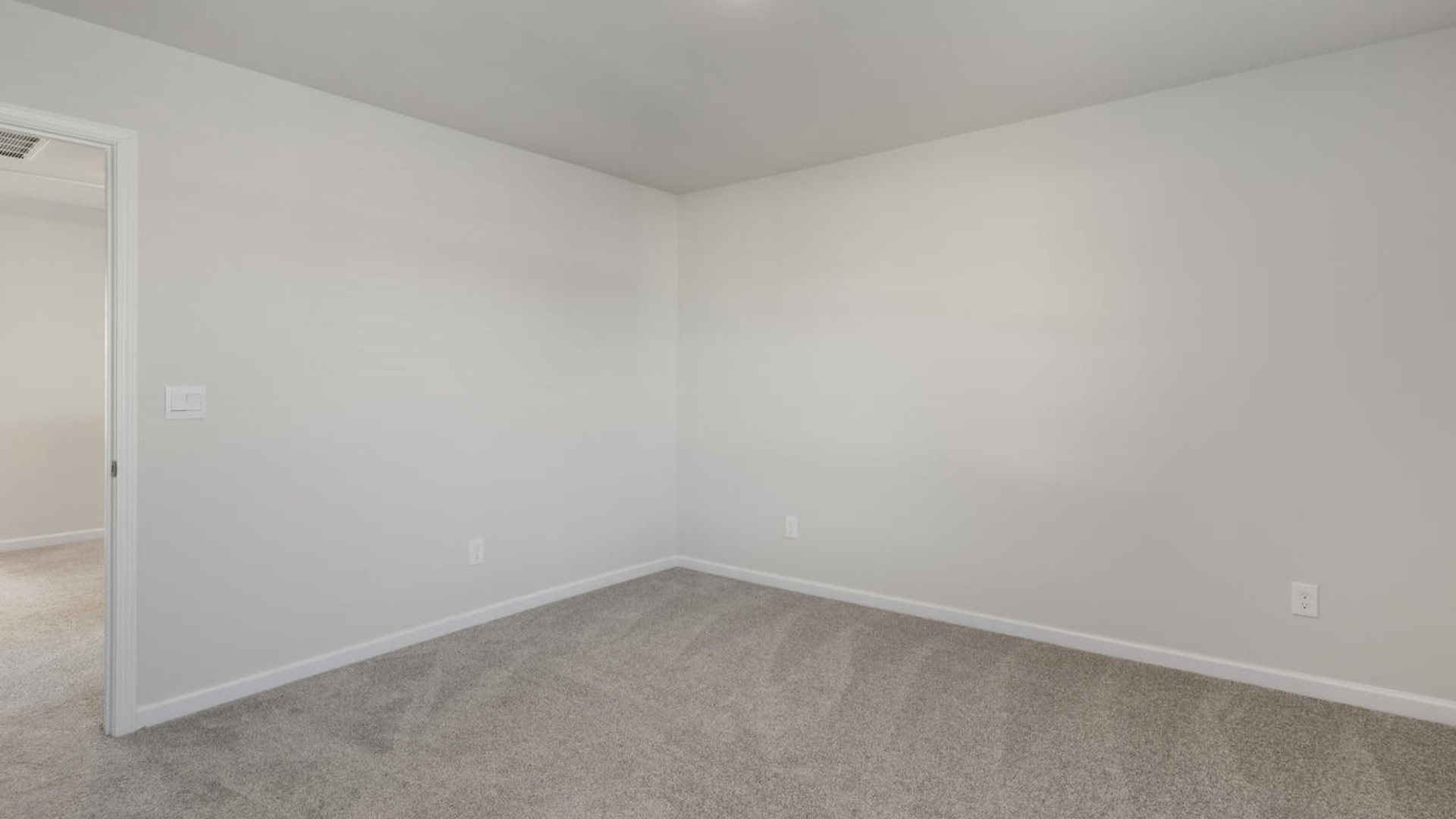 The Tillman floorplan features a first-floor primary suite, formal dining room, a large open living space divided by a kitchen island, and powder room on the first floor. Upstairs you are greeted by an convenient lof