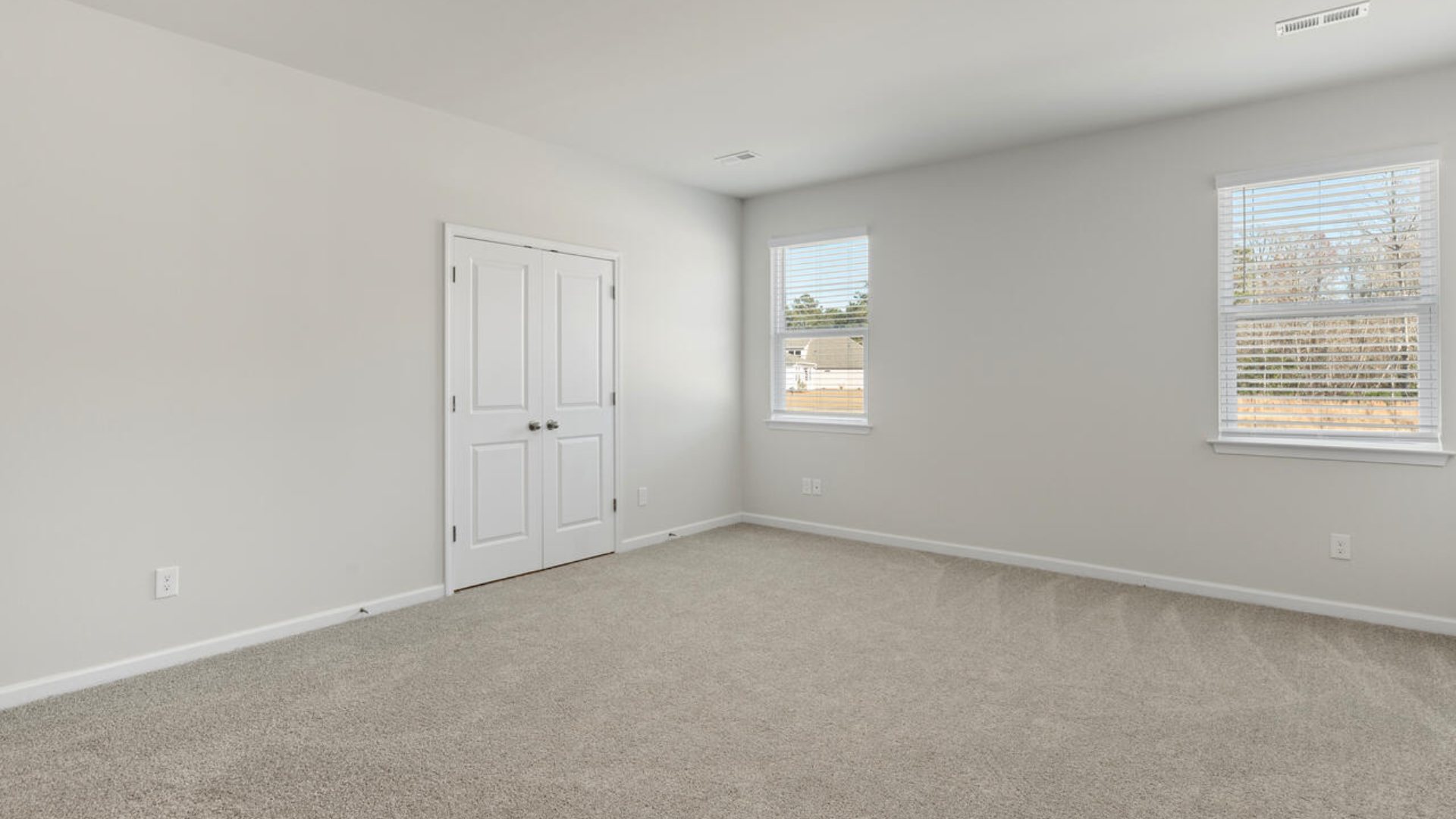 Our Tillman plan is a spacious home with a formal dining room, open concept kitchen with granite countertops, stainless steel appliances and family room with additional seating at the large kitchen island, and a first floor primary bedroom retreat.