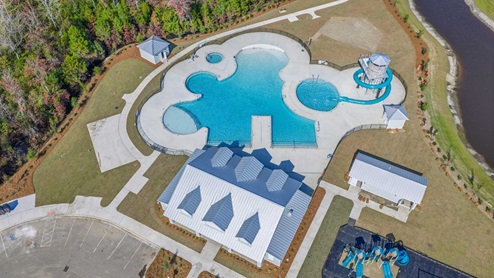 The amenity center will include a swimming pool, multi-sport court, and fire pit, ensuring a well-rounded and enjoyable living experience.