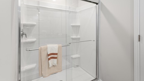 The primary suite on the second level offers a luxurious Primary bath with a soaking garden tub and separate shower, private bathroom, double vanities and a large walk-in clo