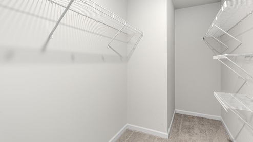 The primary suite on the second level offers a luxurious Primary bath with a soaking garden tub and separate shower, private bathroom, double vanities and a large walk-in clo