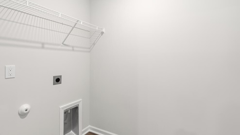 There are 3 additional bedrooms, a full bathroom, a walk-in laundry room, and a loft-style living room on the second level. Enjoy the patio perfect for entertaining and enjoying the Carolina evenings.