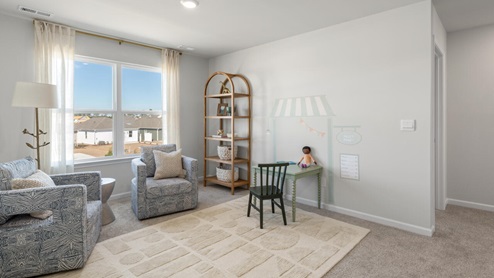 There are 3 additional bedrooms, a full bathroom, a walk-in laundry room, and a loft-style living room on the second level. Enjoy the patio perfect for entertaining and enjoying the Carolina evenings.