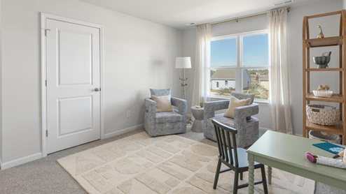 There are 3 additional bedrooms, a full bathroom, a walk-in laundry room, and a loft-style living room on the second level. Enjoy the patio perfect for entertaining and enjoying the Carolina evenings.