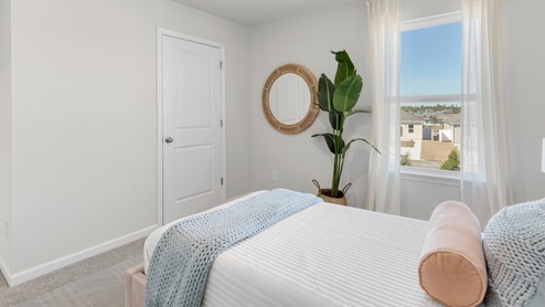 There are 3 additional bedrooms, a full bathroom, a walk-in laundry room, and a loft-style living room on the second level. Enjoy the patio perfect for entertaining and enjoying the Carolina evenings.