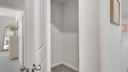 There are 3 additional bedrooms, a full bathroom, a walk-in laundry room, and a loft-style living room on the second level. Enjoy the patio perfect for entertaining and enjoying the Carolina evenings.