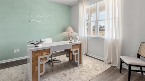 There are 3 additional bedrooms, a full bathroom, a walk-in laundry room, and a loft-style living room on the second level. Enjoy the patio perfect for entertaining and enjoying the Carolina evenings.