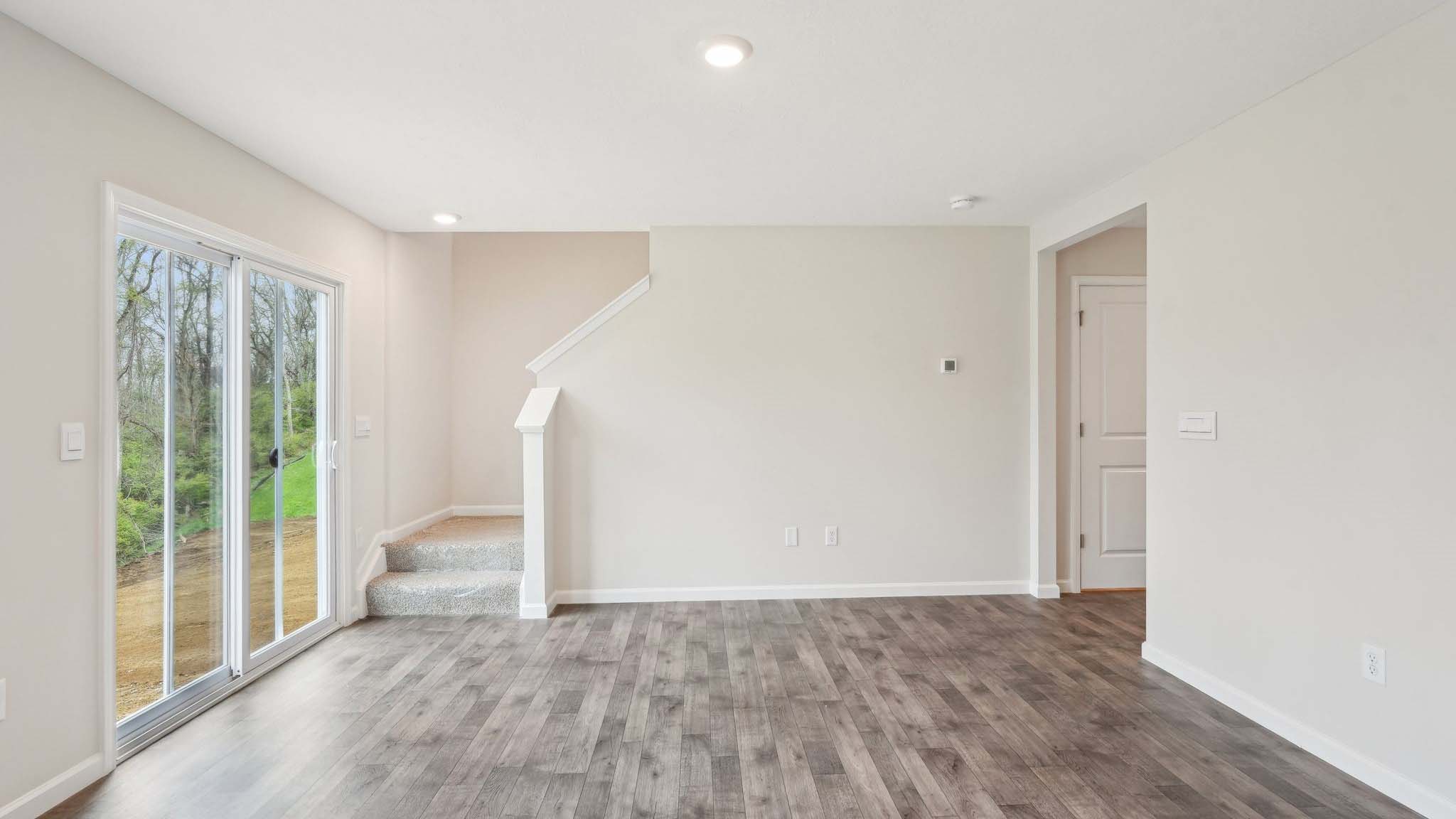 The living area is an open concept, where your kitchen, living, and dining areas blend seamlessly into a space perfect for everyday living and entertaining. There is a downstairs powder room.