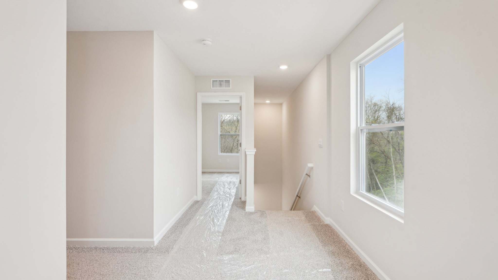 The living area is an open concept, where your kitchen, living, and dining areas blend seamlessly into a space perfect for everyday living and entertaining. There is a downstairs powder room.