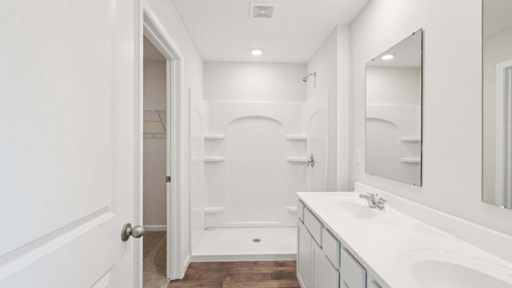 pstairs is a loft that leads into the spacious primary bedroom. The primary bedroom features a walk-in-closet as well as a comfortable en-suite bathroom and sharing a sink isn’t a worry with the double vanity.