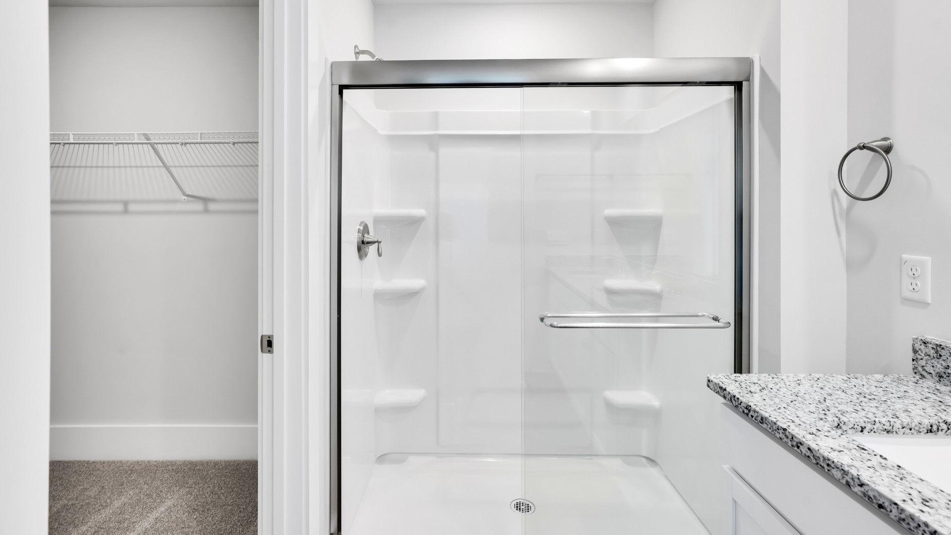 The primary bedroom features a walk-in-closet as well as a comfortable en-suite bathroom and sharing a sink isn’t a worry with the double vanity.
