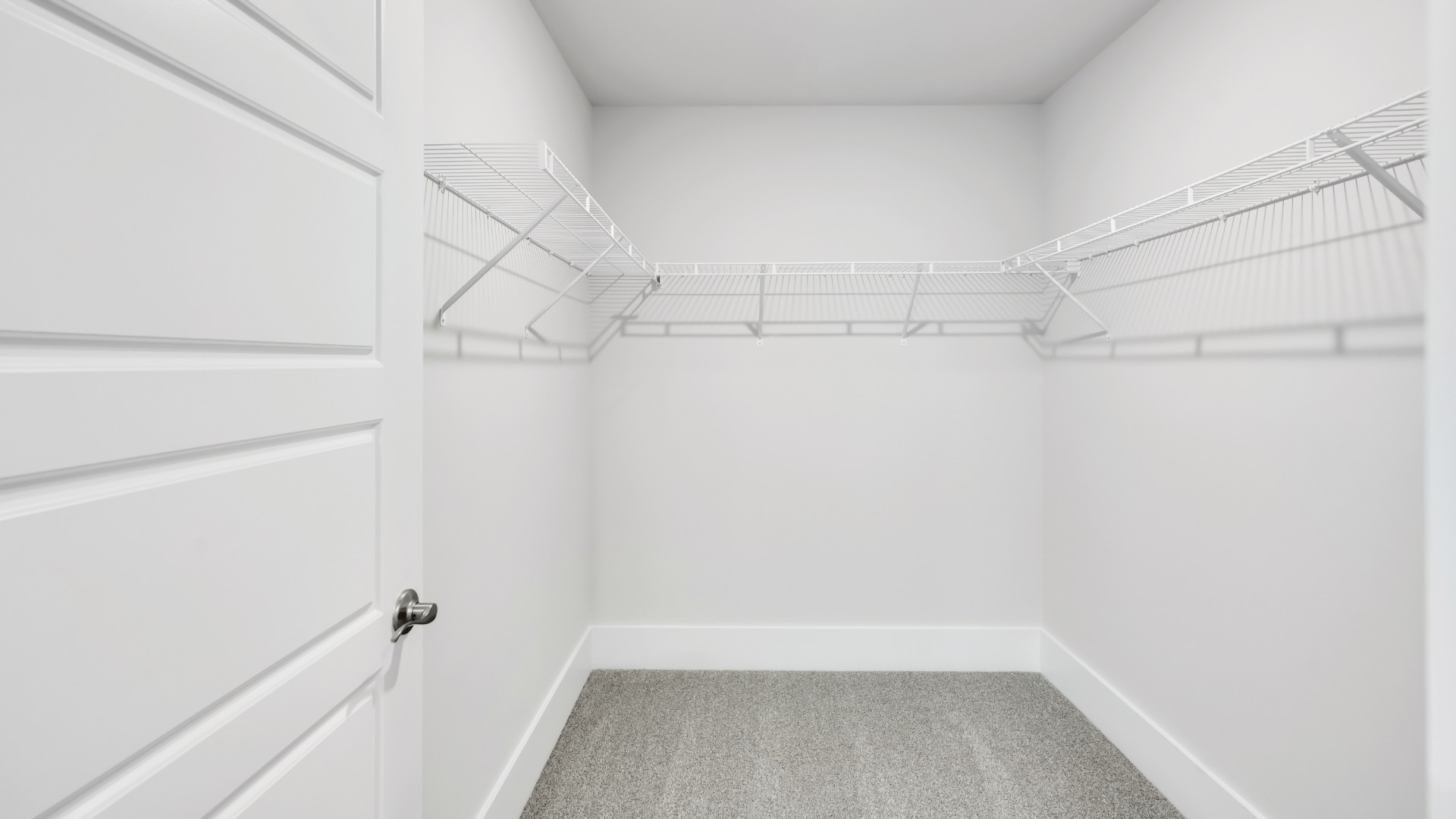 The primary bedroom features a walk-in-closet as well as a comfortable en-suite bathroom and sharing a sink isn’t a worry with the double vanity.