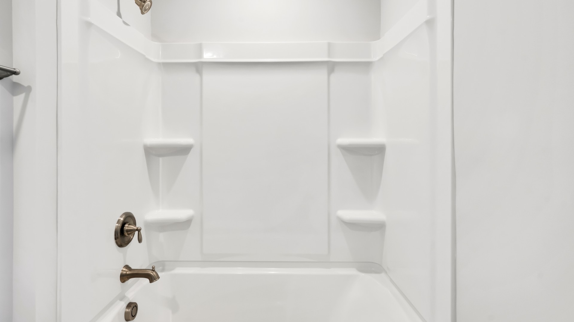 The second floor also features two additional bedrooms that share a bathroom and a large loft space. Enjoy the convenience of a laundry room upstairs.