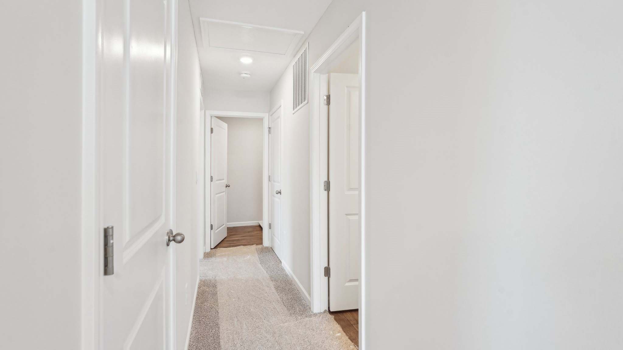 Upstairs is a loft that leads into the spacious primary bedroom. The primary bedroom features a walk-in-closet as well as a comfortable en-suite bathroom and sharing a sink isn’t a worry with the double vanity.