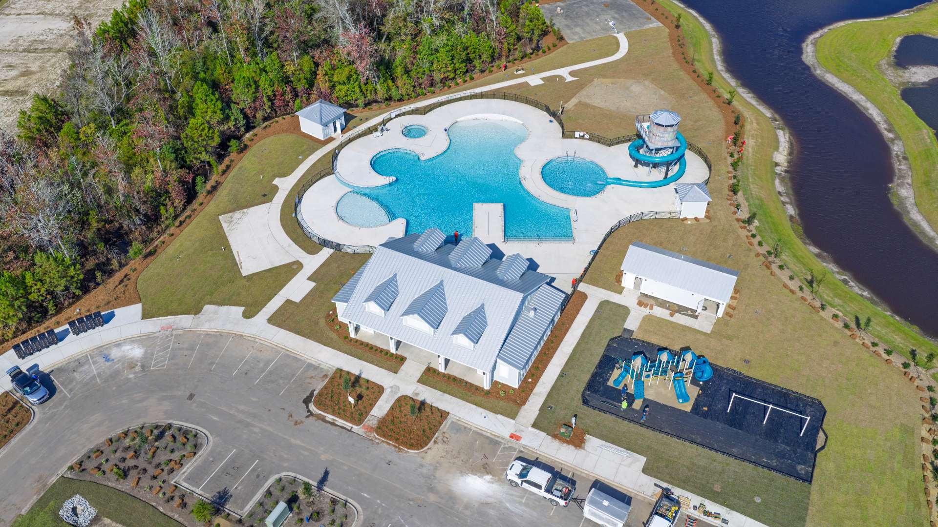 The amenity center that will include a swimming pool, multi-sport court, splashpad, playground, and fire pit, ensuring a well-rounded and enjoyable living experience.