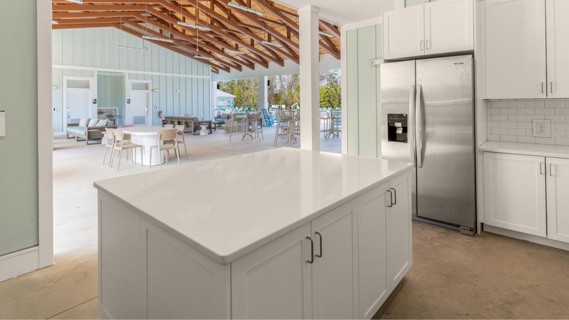 The amenity center that includes a swimming pool, multi-sport court, splashpad, playground, and fire pit, ensuring a well-rounded and enjoyable living experience.