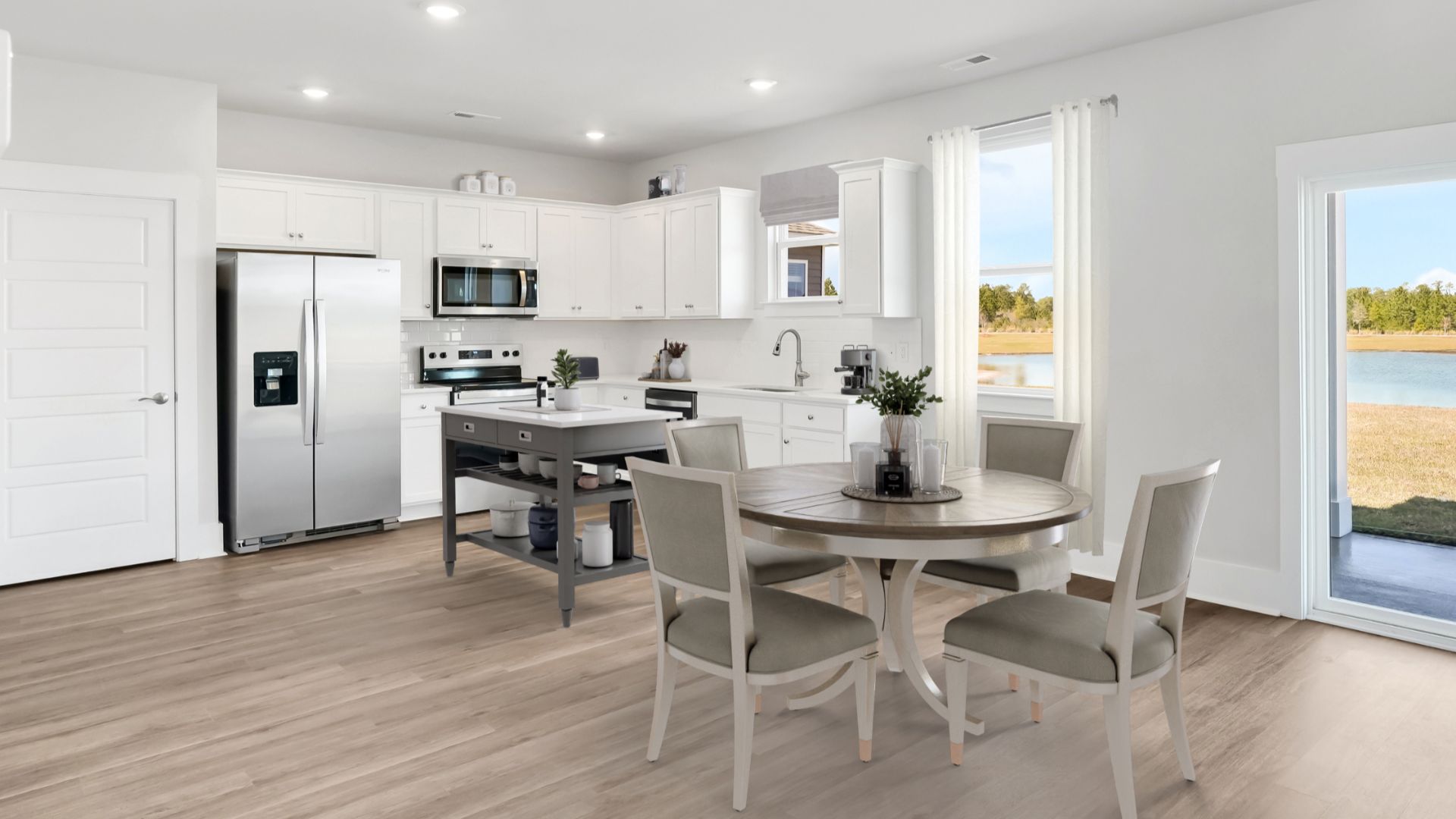 The living area is an open concept, where your kitchen, living, and dining areas blend seamlessly into a space perfect for everyday living and entertaining. There is a downstairs powder room.