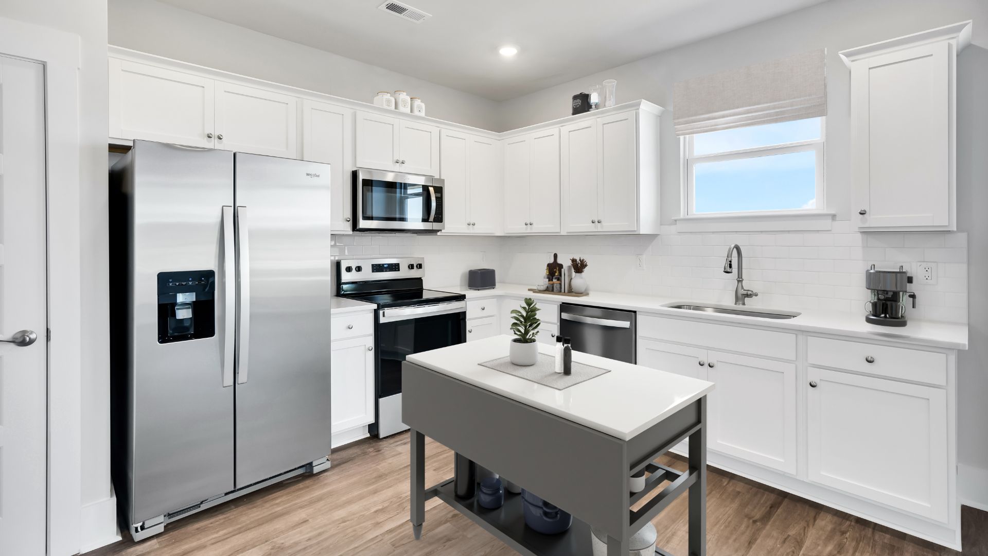 The modern kitchen with a pantry overlooks the cozy living area. Upstairs is a loft that leads into the spacious primary bedroom. The primary bedroom features a walk-in-closet as well as a comfortable en-suite bathroom and sharing a sink isn’t a worry with the double vanity.