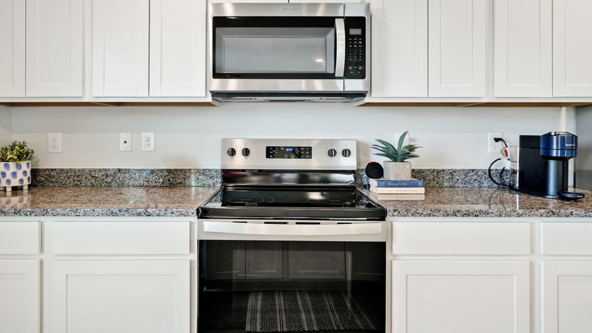 The Galen is a 2,340 sq ft home featuring 4 Bedrooms and 2.5 Baths. Its open-concept design includes a kitchen with granite countertops and stainless steel appliances, an island, and a walk-in pantry, while the large Great Room is ideal for entertaining.