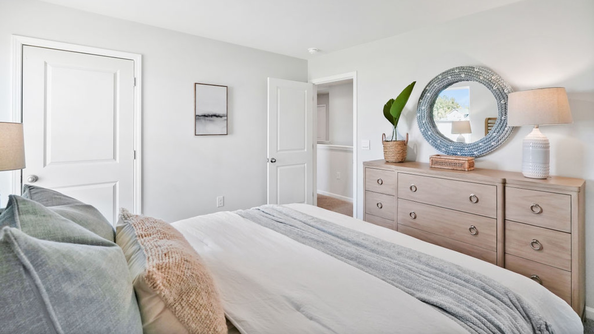 Upstairs, the Primary Suite offers a private bathroom, and the rest of the second floor includes three additional bedrooms and a convenient laundry room. With its spacious layout and modern amenities, t