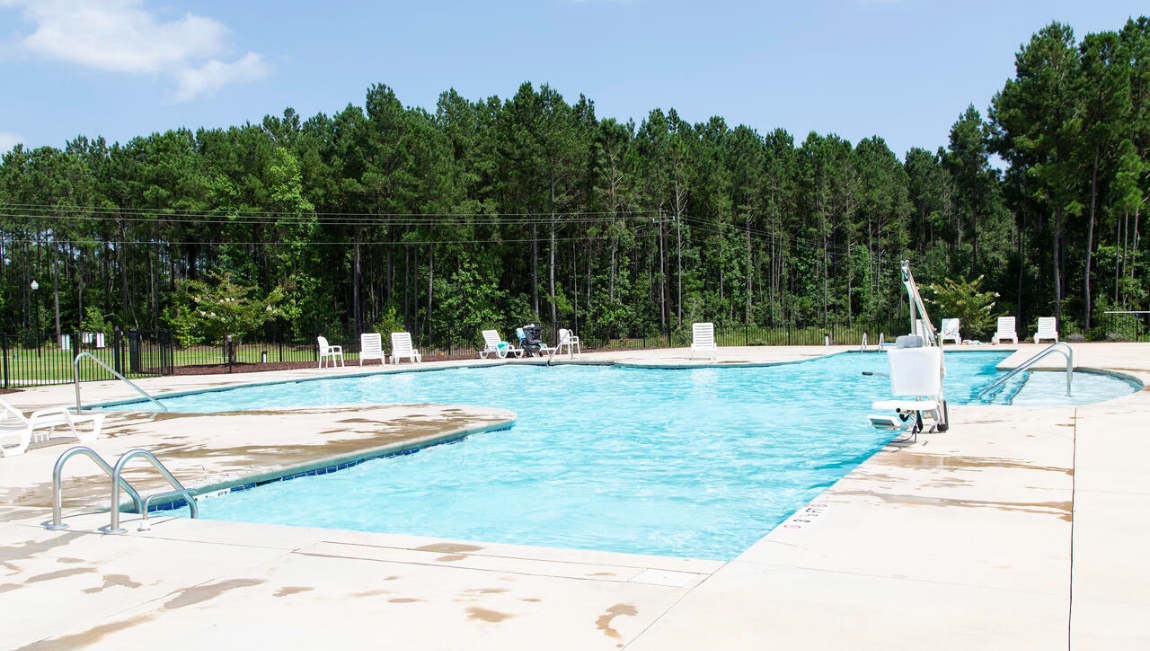 The community amenities include a pool, cabana with kitchen and walking trails.