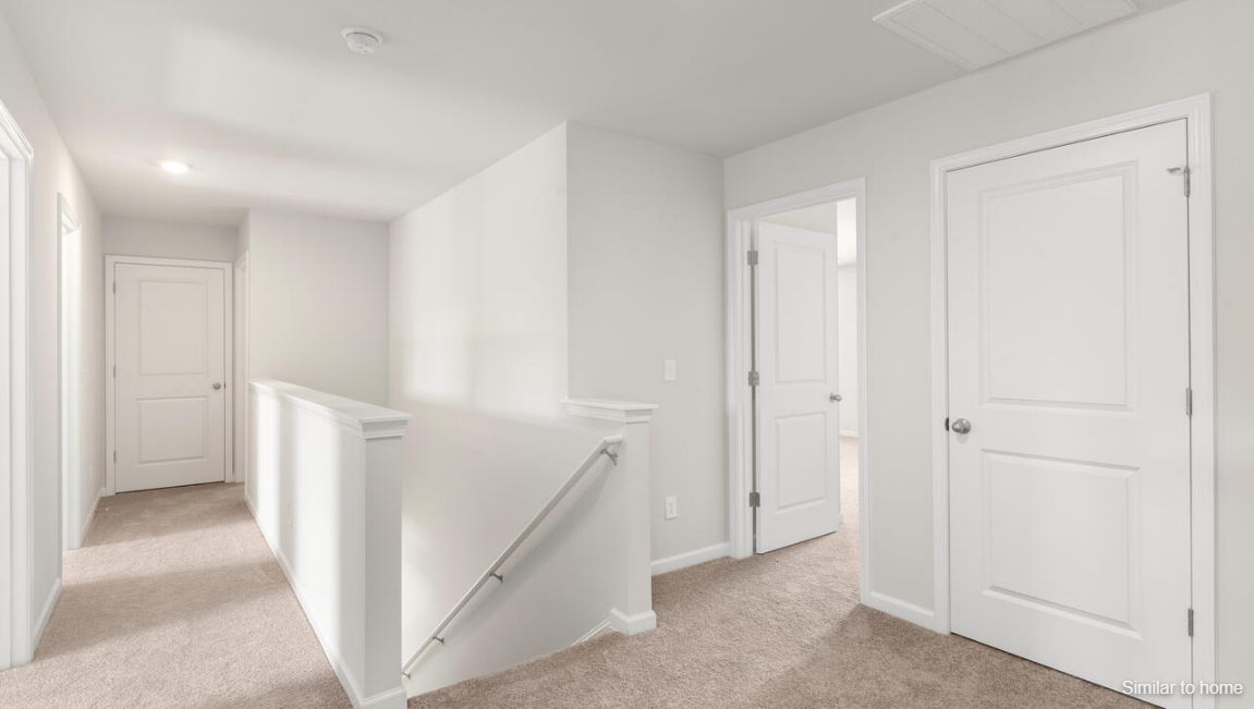 Upstairs, the Primary Suite offers a private bathroom, and the rest of the second floor includes three additional bedrooms and a convenient laundry room