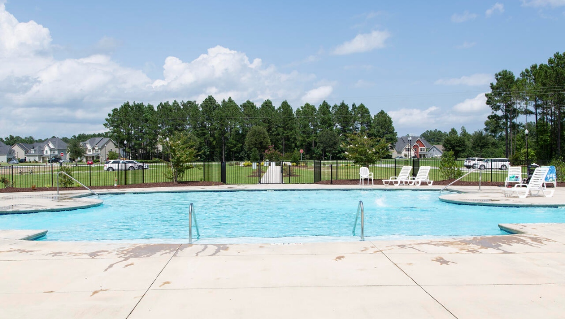 Homeowners will enjoy a pool, pavilion with kitchen, sidewalks and green space.