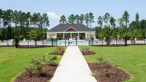 The Aria is a 3-bedroom, 2-bathroom home with 1,618 square feet of open living space. Its centerpiece is the showstopper kitchen, featuring a large island, stainless steel appliances, and a spacious pantry.