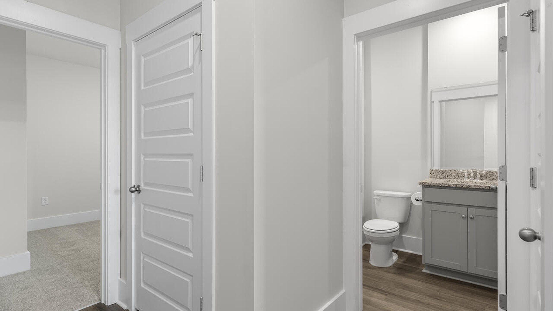 Also, enjoy a split bedroom layout with the remaining two bedrooms can be found towards the front of the home. In every bedroom you’ll have carpeted floors and a closet in each room.