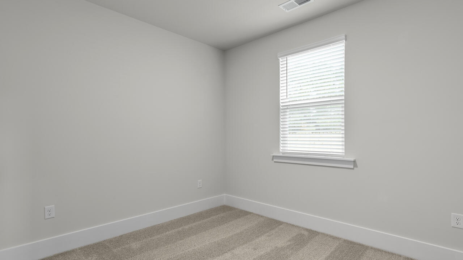 Also, enjoy a split bedroom layout with the remaining two bedrooms can be found towards the front of the home. In every bedroom you’ll have carpeted floors and a closet in each room.