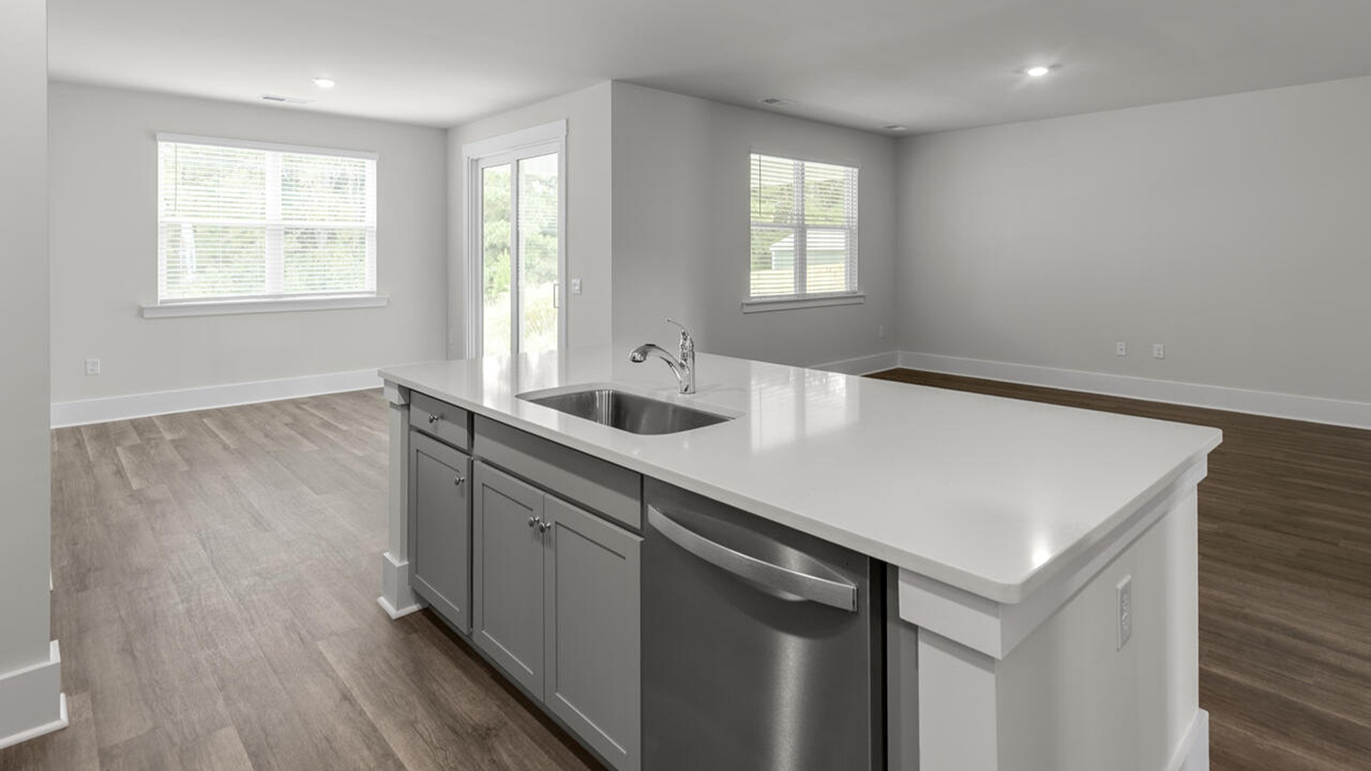 The Bradford is a versatile plan with an open concept kitchen, living, and dining area! The kitchen comes finished with beautiful granite countertops, stainless steel appliances, single-bowl sink and tile backsplash.