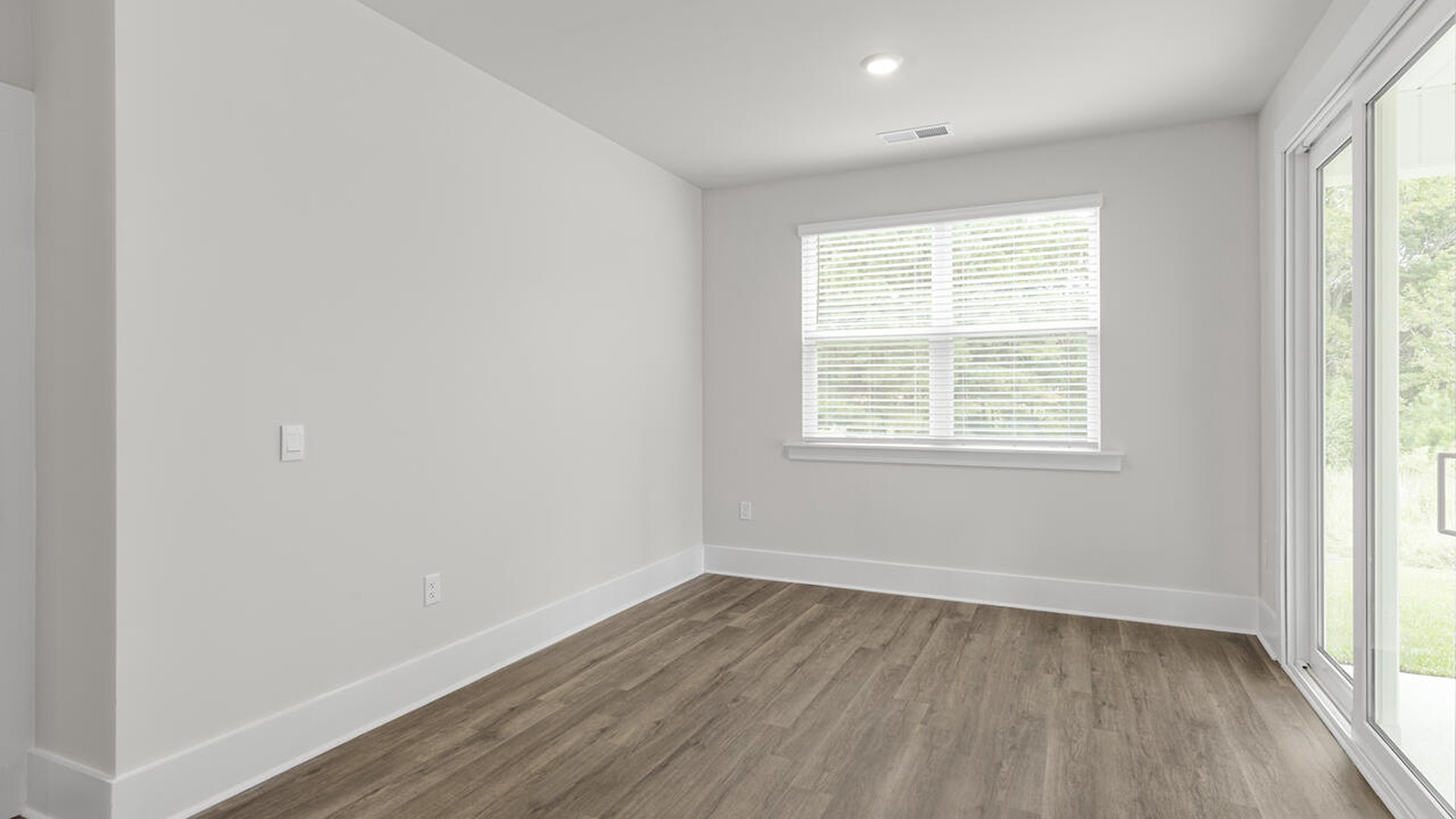 The Bradford is a versatile plan with an open concept kitchen, living, and dining area! The kitchen comes finished with beautiful granite countertops, stainless steel appliances, single-bowl sink and tile backsplash.
