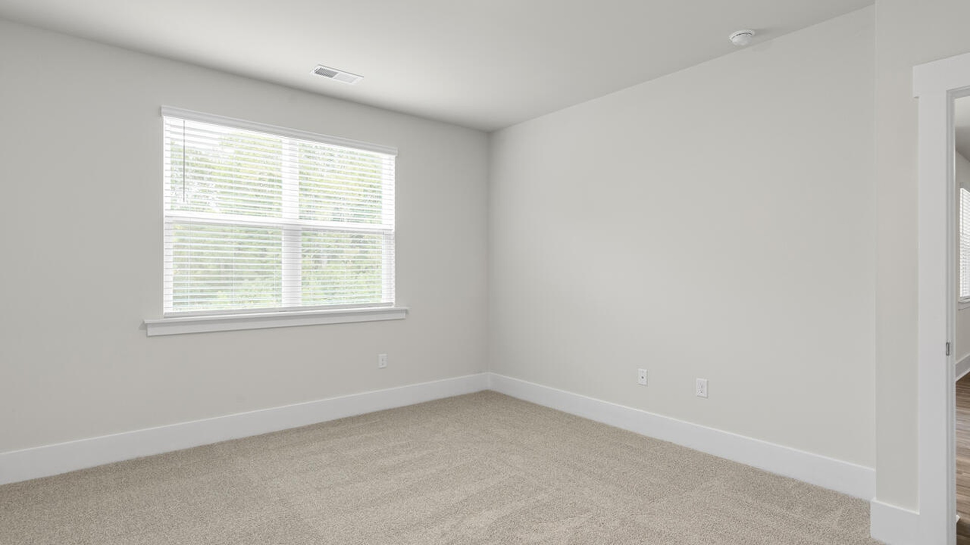 The primary bedroom has its own attached bathroom that features a walk-in closet and all the space you need to get ready in the morning.