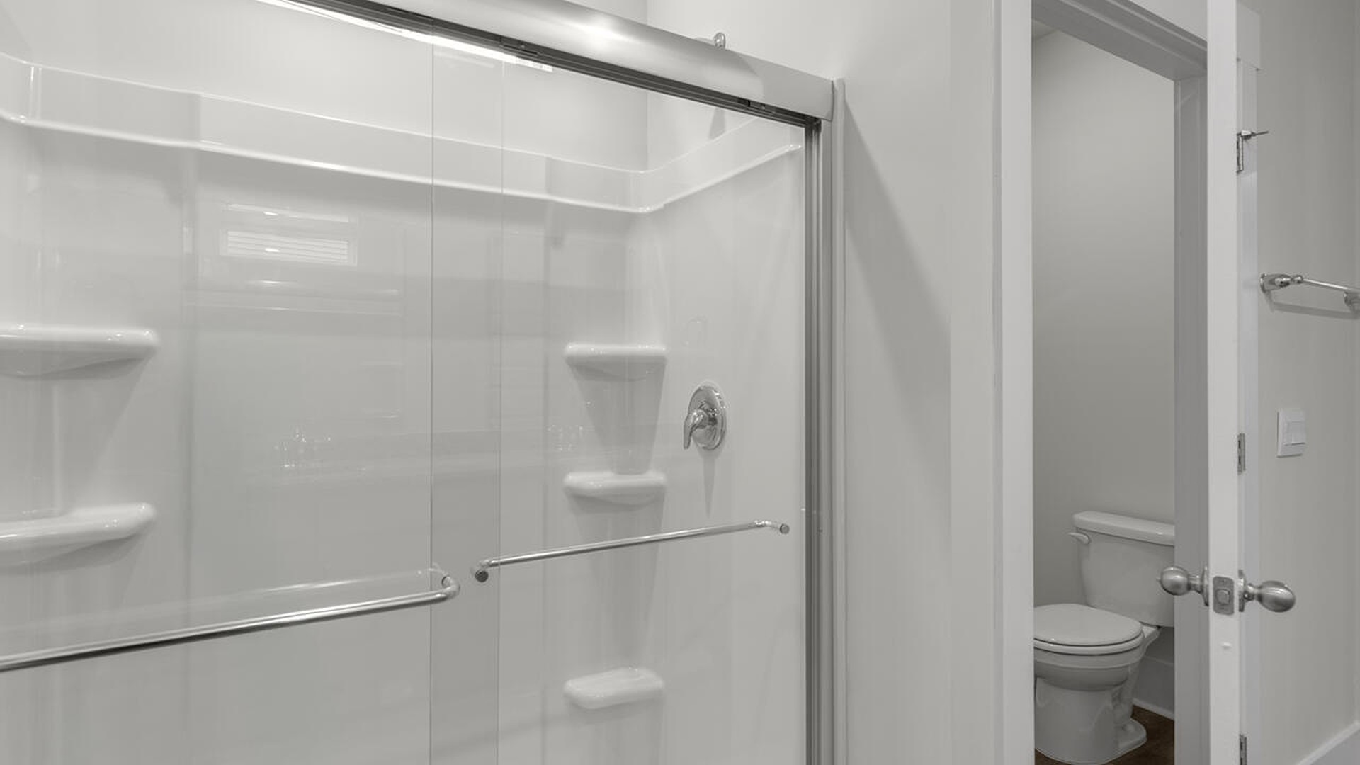 The primary bedroom has its own attached bathroom that features a walk-in closet and all the space you need to get ready in the morning.