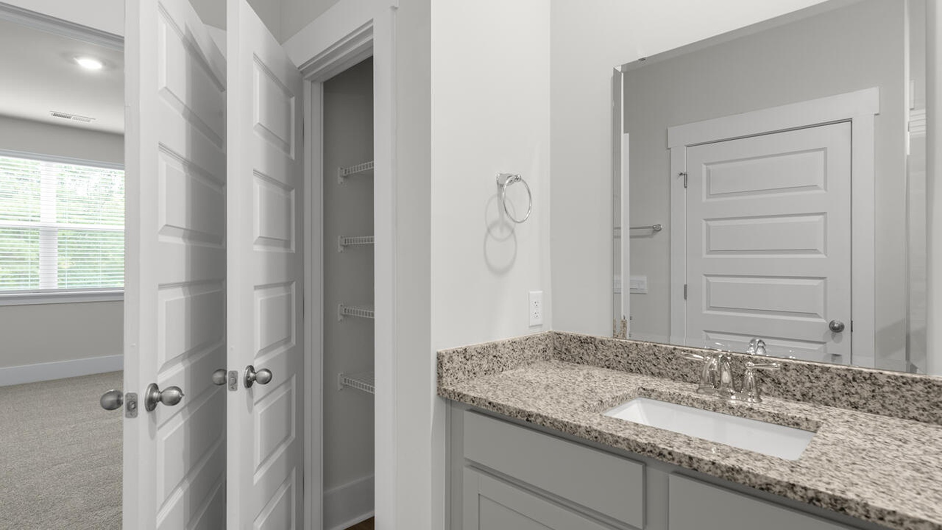 The primary bedroom has its own attached bathroom that features a walk-in closet and all the space you need to get ready in the morning.
