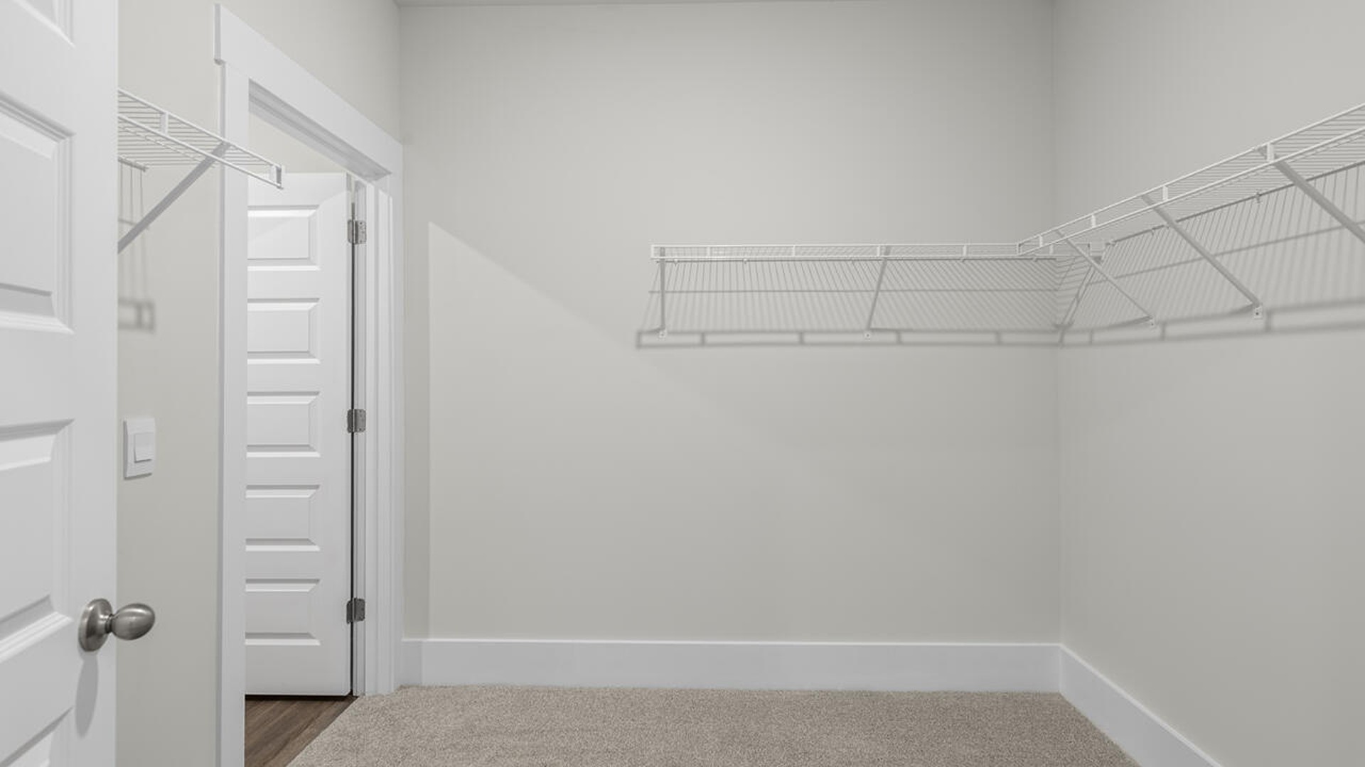 The primary bedroom has its own attached bathroom that features a walk-in closet and all the space you need to get ready in the morning.