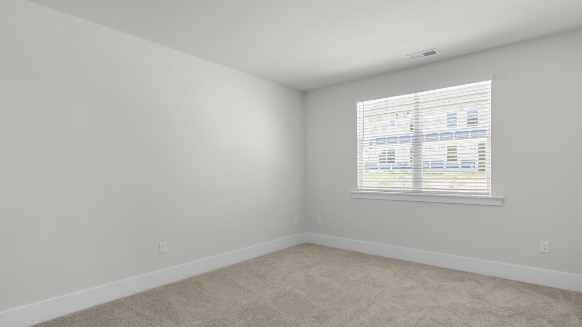 The primary suite as well as on suite is sure to impress with double vanities and a massive walk-in closet. A large, covered porch perfect for entertaining and enjoying the Carolina evenings