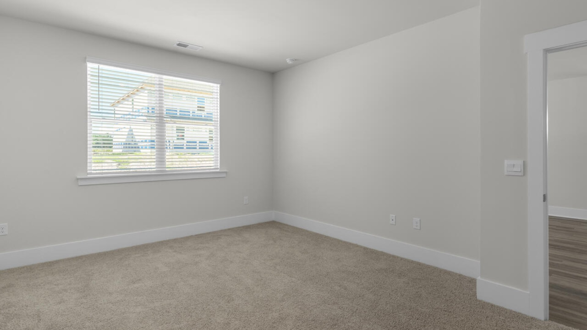 The primary suite as well as on suite is sure to impress with double vanities and a massive walk-in closet. A large, covered porch perfect for entertaining and enjoying the Carolina evenings