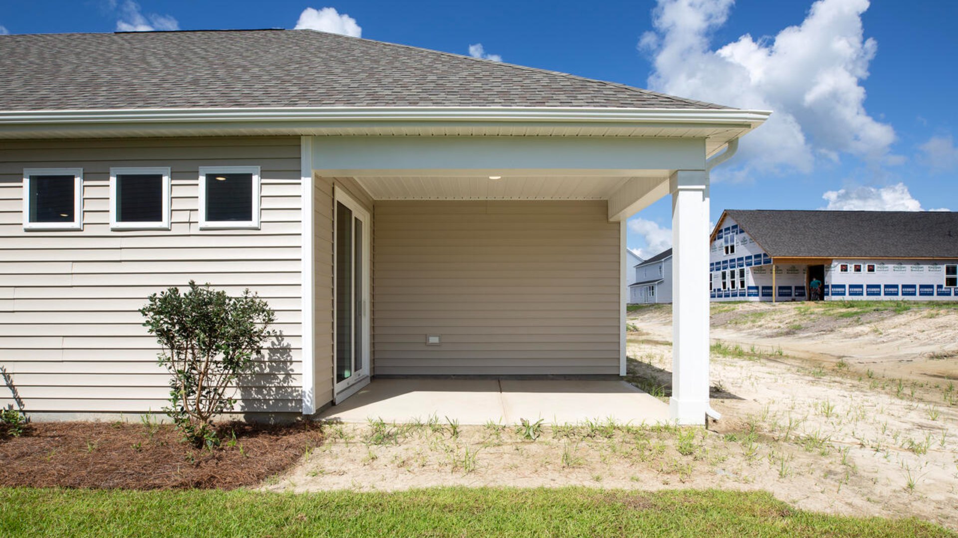 A large, covered porch perfect for entertaining and enjoying the Carolina evenings.