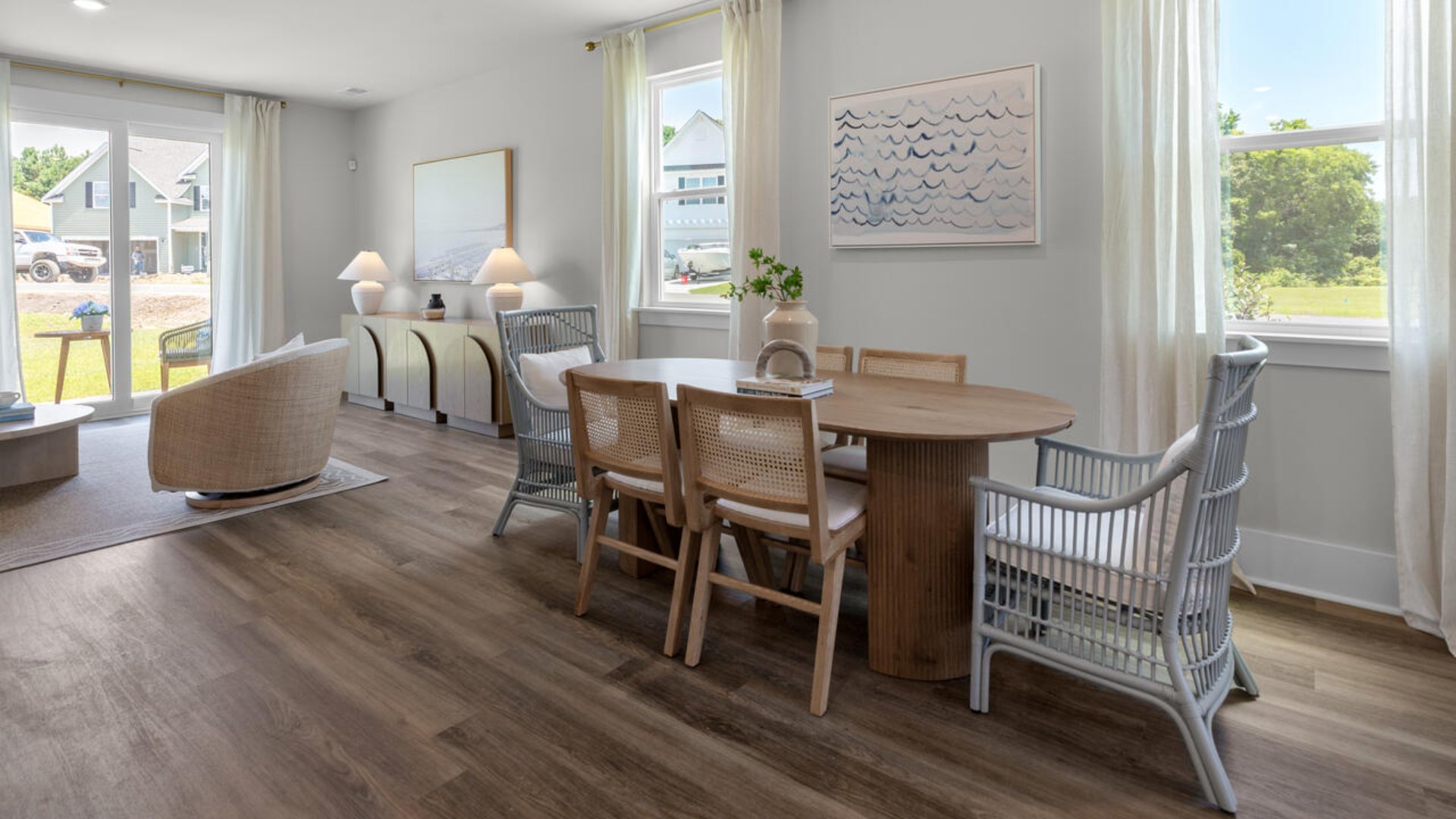 Throughout the home, Luxury Vinyl Plank (LVP) flooring and stain-resistant carpets offer durability and comfort.